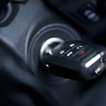 Modern Car Keys with Remote in Ignition Keyhole